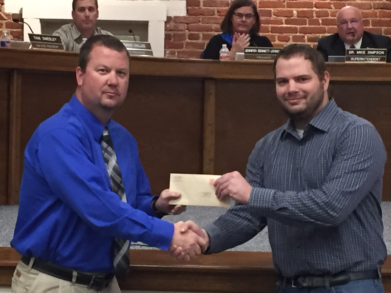 Manager Brian Billings and his Sonic franchise donate to school